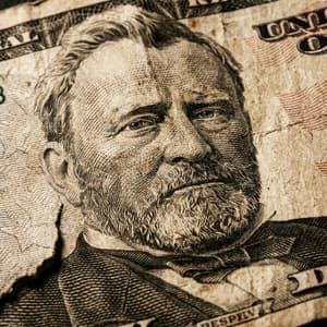 Macro shot of engraved portrait on old weathered paper bill with intricate line work ink bleeding and paper fiber textures, dramatic raking lighting, sepia tones vintage historical feel