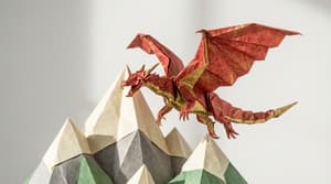 Complex origami scene with meticulously folded paper dragon soaring over geometric paper mountain range, high-quality origami paper textures with sharp creases precise folds and soft realistic shadows creating physical presence and depth, minimalist clean background